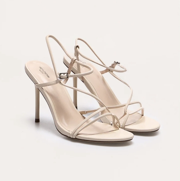 NIB PrettyLittleThing Cream Pu Strappy Asymmetric Buckle Stiletto Heels Wide Fit - Picture 1 of 10